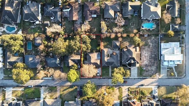 birds eye view of property with a residential view