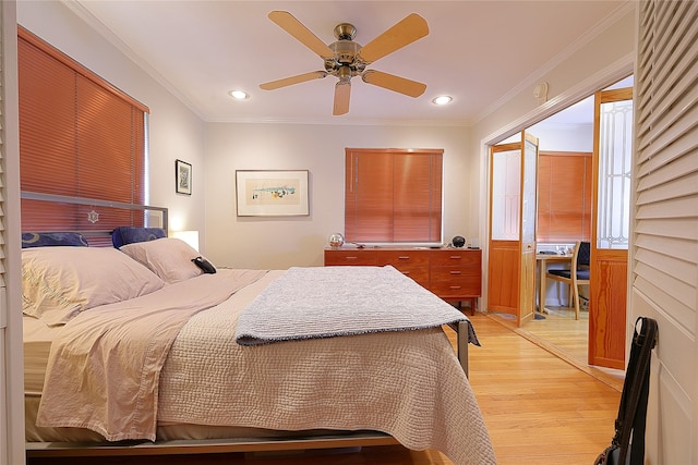 bedroom featuring ornamental molding, recessed lighting, light wood-style floors, and a ceiling fan