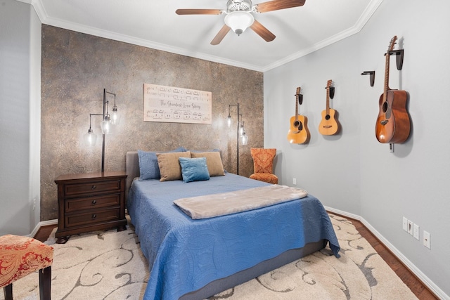bedroom featuring a ceiling fan, baseboards, ornamental molding, and wood finished floors