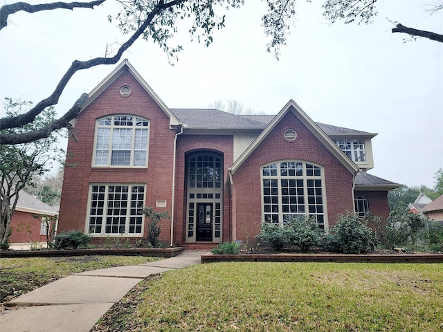 view of front of house with a front lawn