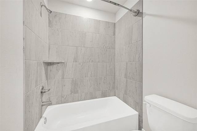 bathroom featuring toilet and shower / bathtub combination