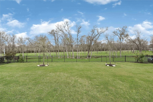 view of yard with fence