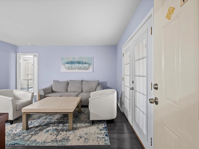 living room with dark wood-type flooring