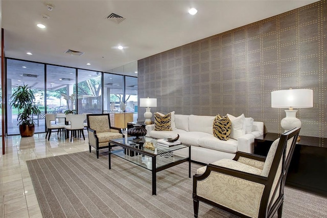 lobby with expansive windows and light tile patterned flooring