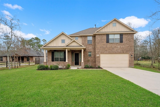 craftsman inspired home with driveway, fence, a front lawn, and brick siding