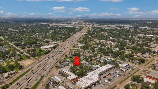 birds eye view of property with a city view