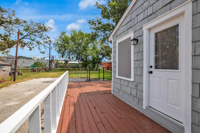 wooden deck featuring fence