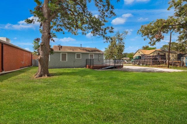 view of yard with a deck