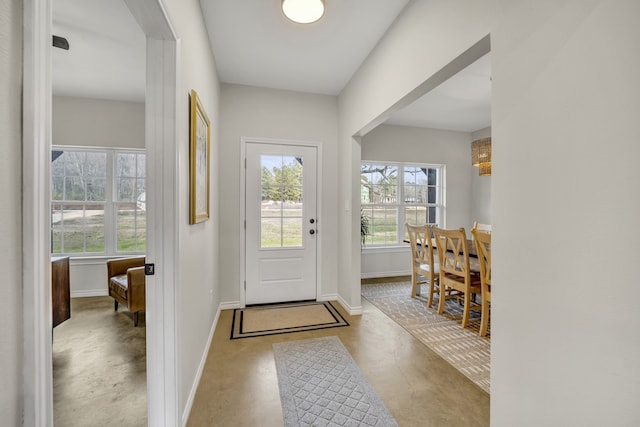 doorway to outside featuring a wealth of natural light