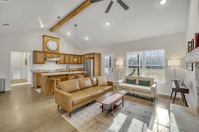 living room with beamed ceiling, ceiling fan, sink, and high vaulted ceiling