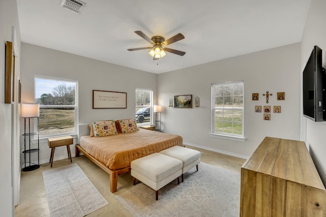 bedroom with light colored carpet and ceiling fan