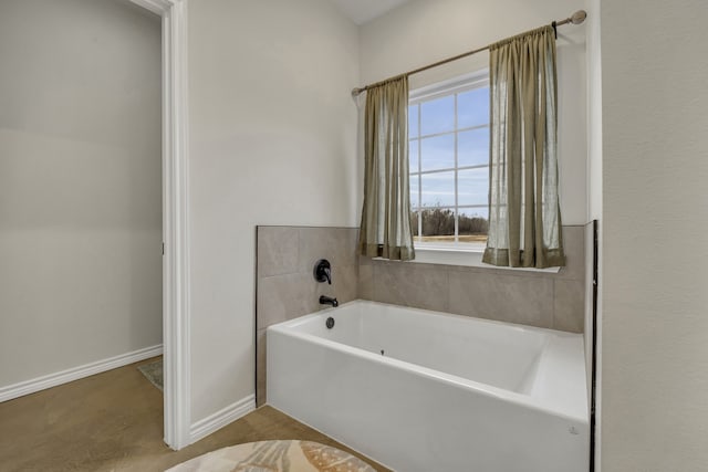 bathroom featuring a washtub