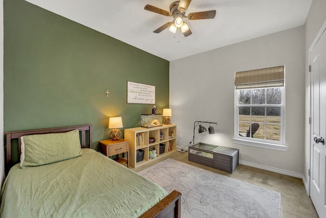 carpeted bedroom with ceiling fan