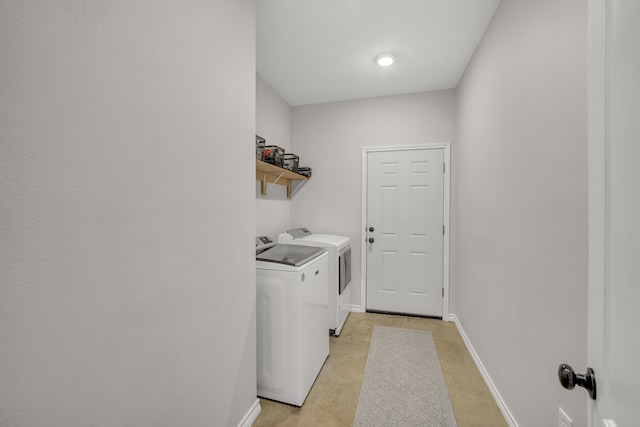 laundry area featuring washing machine and dryer