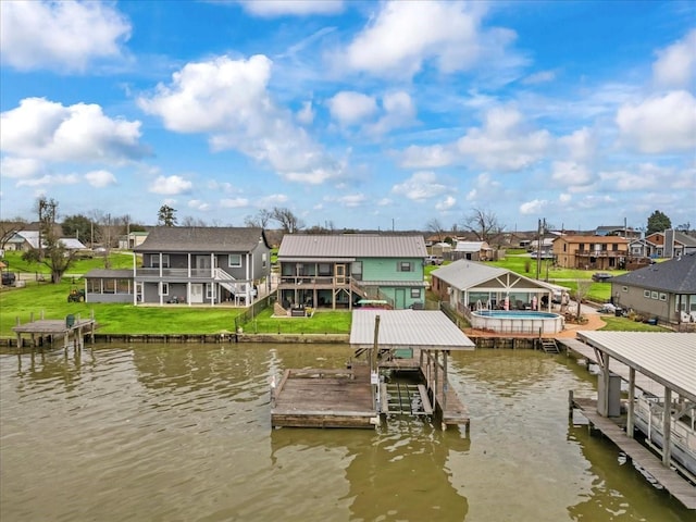 308 Lakeshore S, Onalaska, TX 77360 - view of dock with a water view, a residential view, and boat lift