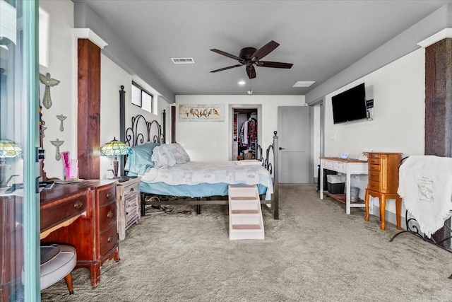 308 Lakeshore S, Onalaska, TX 77360 - bedroom featuring carpet, visible vents, ceiling fan, a spacious closet, and recessed lighting