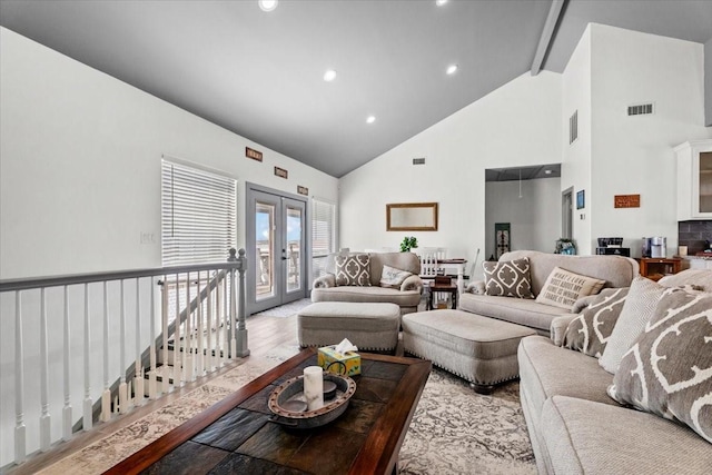 308 Lakeshore S, Onalaska, TX 77360 - living room with french doors, recessed lighting, visible vents, high vaulted ceiling, and beam ceiling