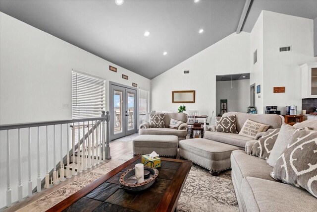 308 Lakeshore S, Onalaska, TX 77360 - living room with high vaulted ceiling, french doors, beamed ceiling, and recessed lighting