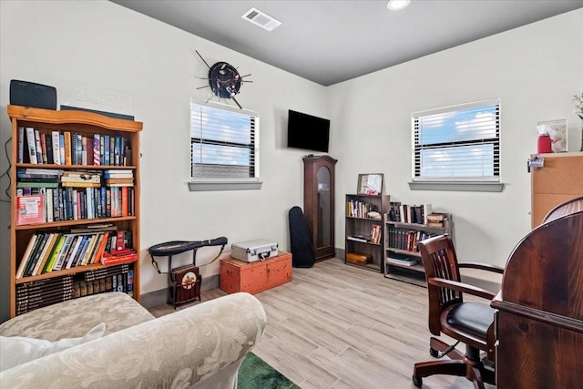 308 Lakeshore S, Onalaska, TX 77360 - office area featuring wood finished floors, visible vents, and baseboards