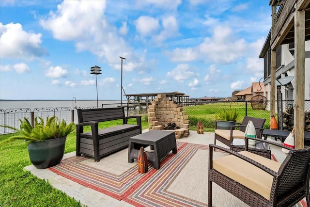 308 Lakeshore S, Onalaska, TX 77360 - view of patio with an outdoor fireplace and fence