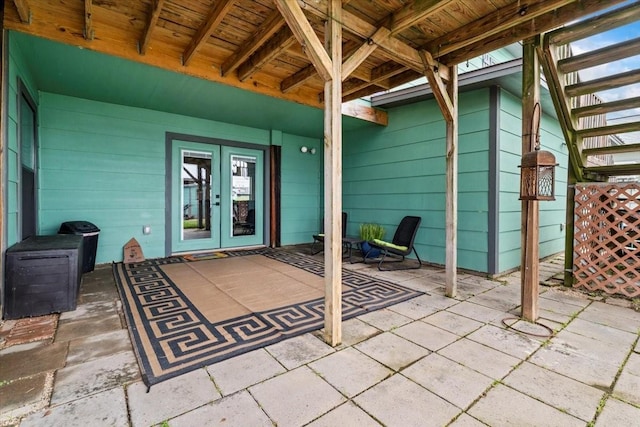 308 Lakeshore S, Onalaska, TX 77360 - view of patio / terrace featuring french doors