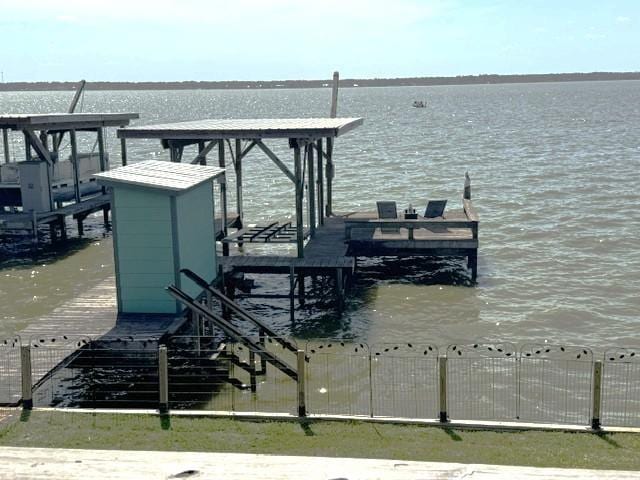 308 Lakeshore S, Onalaska, TX 77360 - view of dock with boat lift and a water view