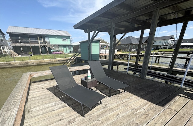 308 Lakeshore S, Onalaska, TX 77360 - view of dock with a water view and a residential view