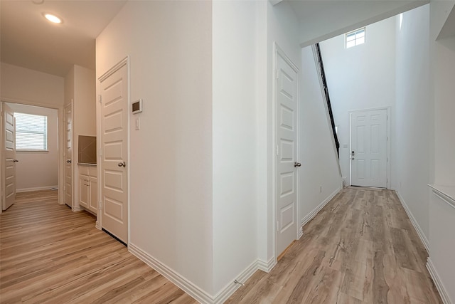 corridor featuring light wood-type flooring