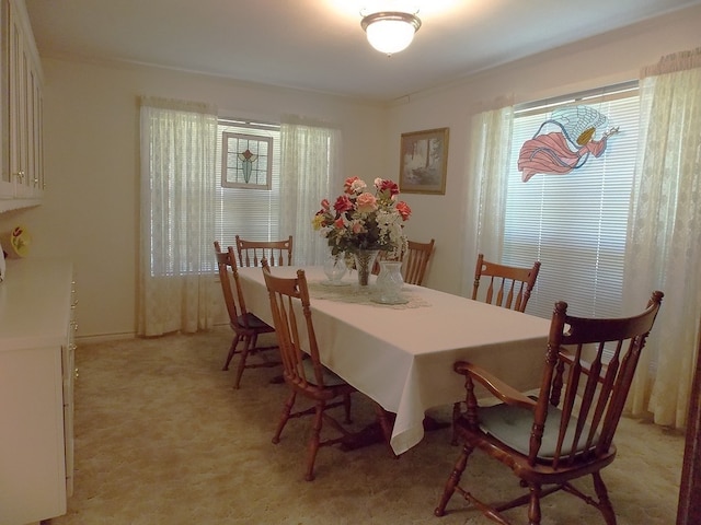 view of carpeted dining room