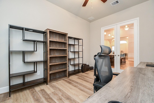 office space with light hardwood / wood-style floors, french doors, and ceiling fan