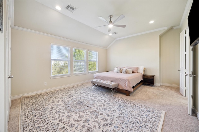 bedroom with crown molding, lofted ceiling, light carpet, and ceiling fan