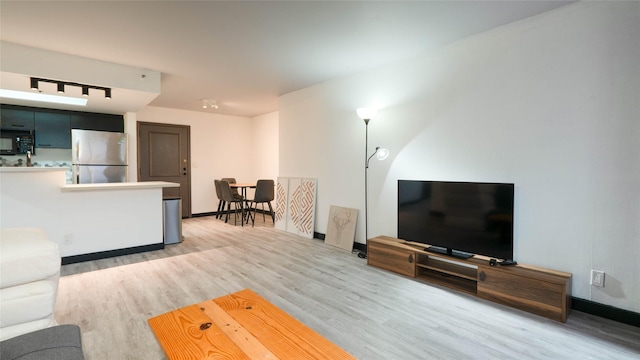 living room featuring hardwood / wood-style floors