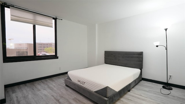 bedroom featuring hardwood / wood-style floors