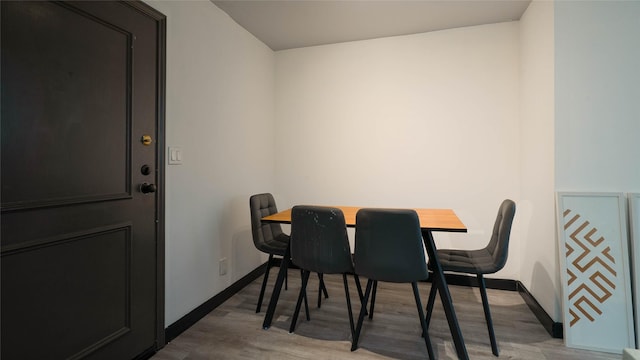 dining room featuring wood-type flooring