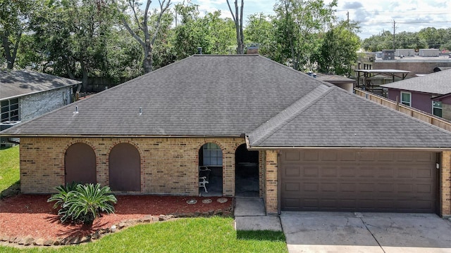 view of front of property featuring a garage