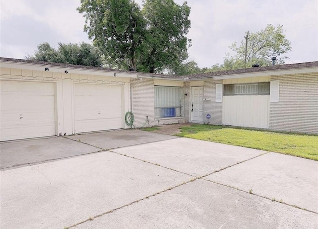 garage with a lawn