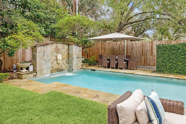 view of swimming pool featuring pool water feature