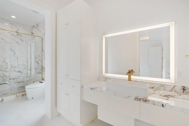 full bathroom featuring a marble finish shower, toilet, marble finish floor, vanity, and recessed lighting