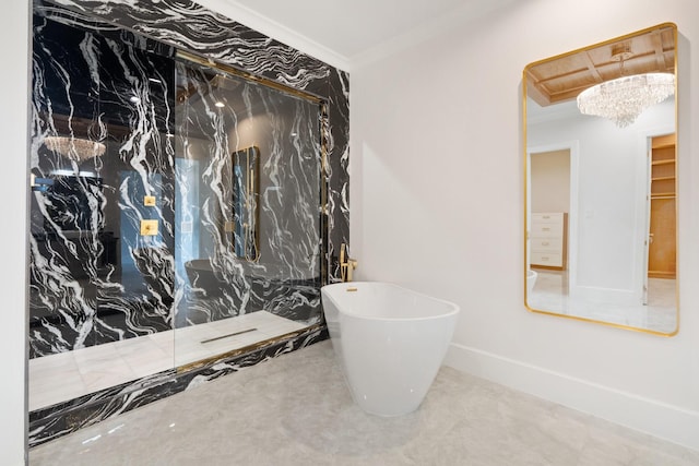 full bath featuring a soaking tub, baseboards, crown molding, and a marble finish shower