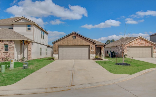 view of front of house with a garage and a front lawn