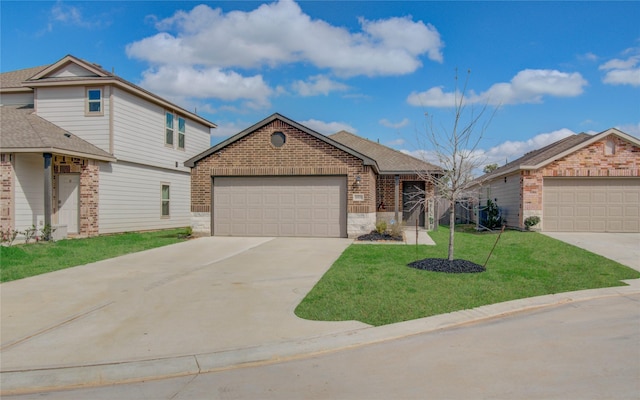 view of front facade featuring a garage and a front lawn