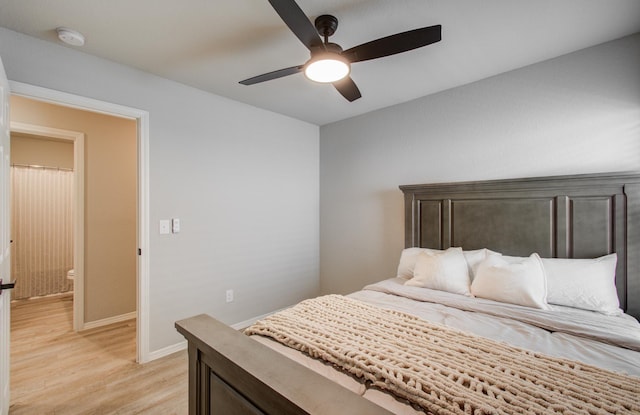 bedroom featuring ceiling fan and light wood-type flooring