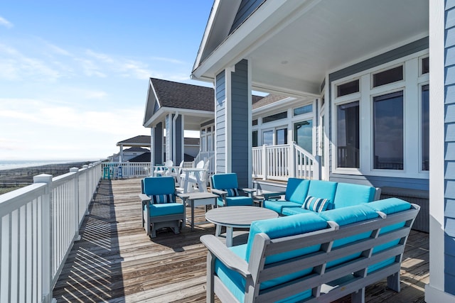 19307 Shores Dr, Galveston, TX 77554 - wooden deck featuring an outdoor living space