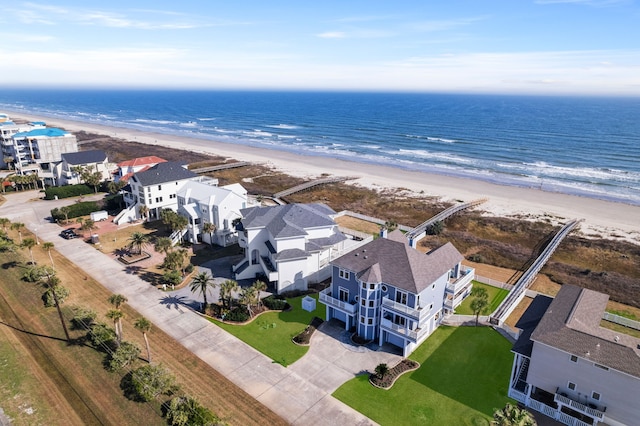 19307 Shores Dr, Galveston, TX 77554 - drone / aerial view featuring a water view and a view of the beach