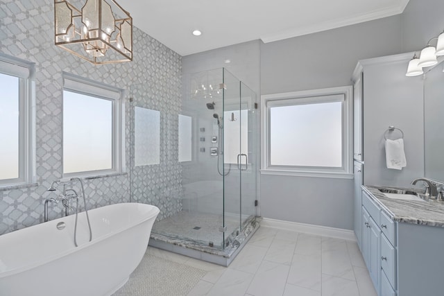 19307 Shores Dr, Galveston, TX 77554 - bathroom with ornamental molding, vanity, and plus walk in shower