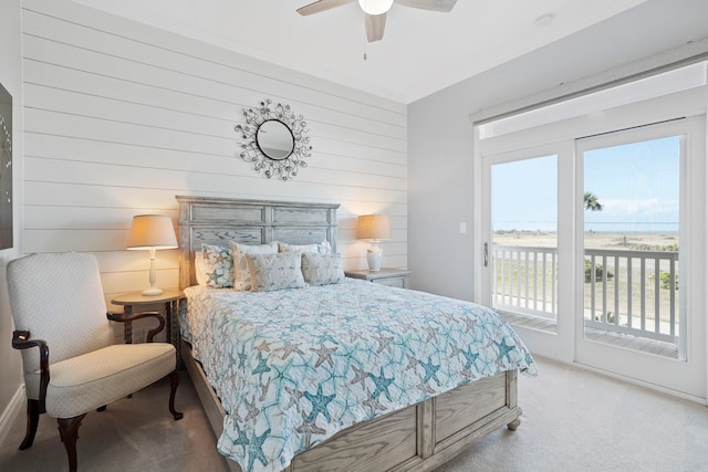 19307 Shores Dr, Galveston, TX 77554 - carpeted bedroom featuring ceiling fan and access to exterior