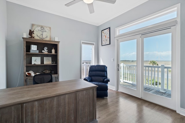 19307 Shores Dr, Galveston, TX 77554 - office with crown molding, dark wood-type flooring, and ceiling fan