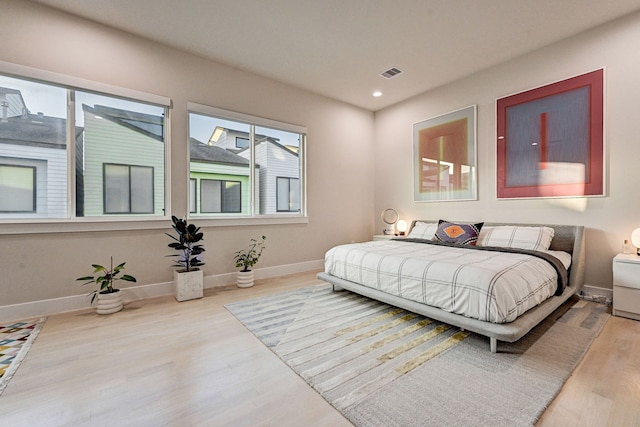 bedroom featuring light hardwood / wood-style floors