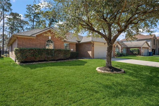 single story home featuring a front lawn, brick siding, driveway, and an attached garage