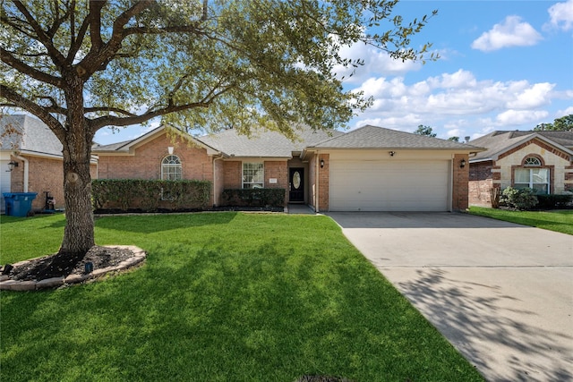 ranch-style home featuring a front lawn, brick siding, driveway, and an attached garage